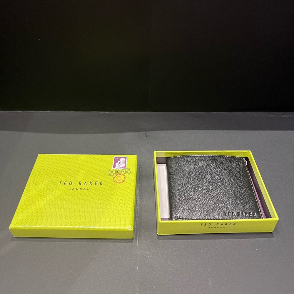 Ted Baker Men’s black leather wallet.